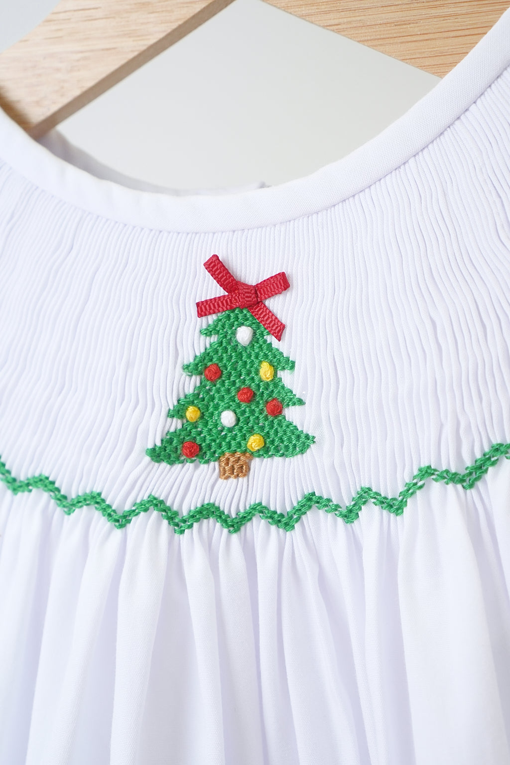 White Christmas tree hand smocked girl romper