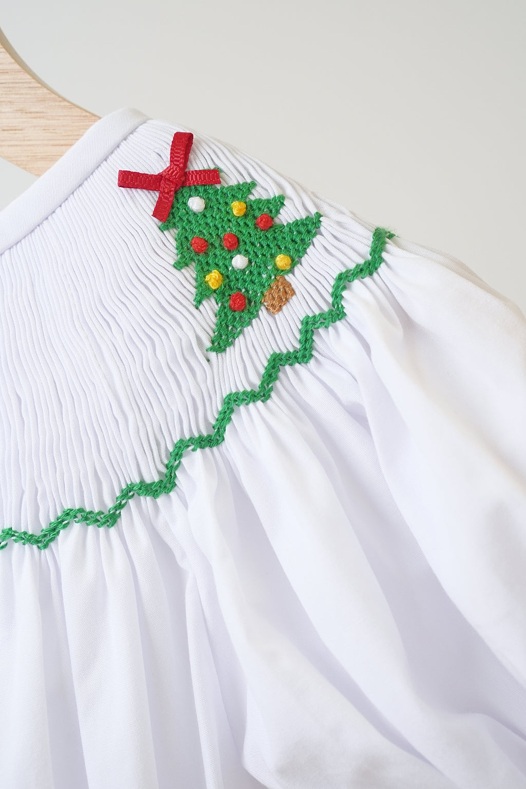 White Christmas tree hand smocked girl romper